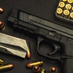 a photo of a smith & wesson M&P 45 acp pistol with ball ammo